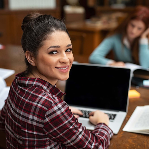 Students working in a library